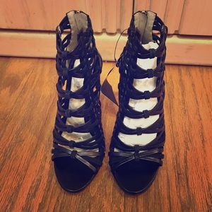 Jason Wu leather and suede strapped heels.